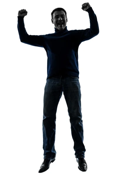 Uomo che salta felice silhouette vittoriosa a tutta lunghezza — Foto Stock