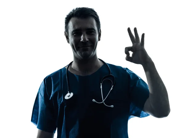 Doctor man silhouette okay gesture portrait — Stock Photo, Image