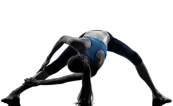 Woman exercising yoga stretching legs warm up — Stock Photo, Image