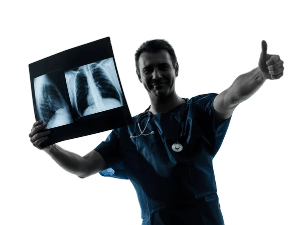 Doctor surgeon radiologist examining lung torso x-ray image thu — Stock Photo, Image