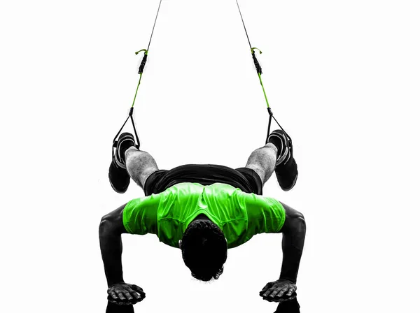 Homem exercício suspensão formação trx silhueta — Fotografia de Stock