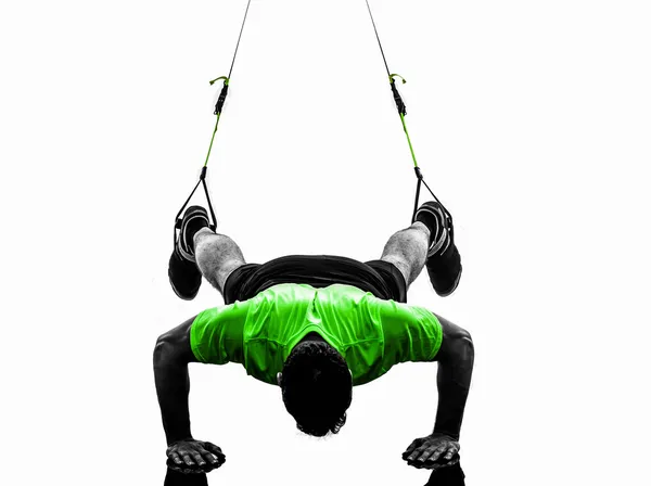 Homme exerçant l'entraînement de suspension trx silhouette — Photo