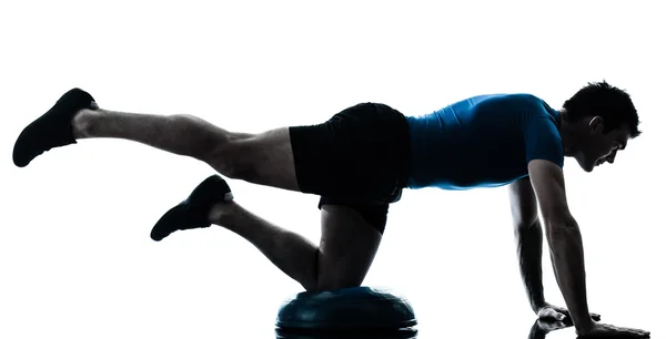 Man exercising bosu workout fitness posture — Stock Photo, Image
