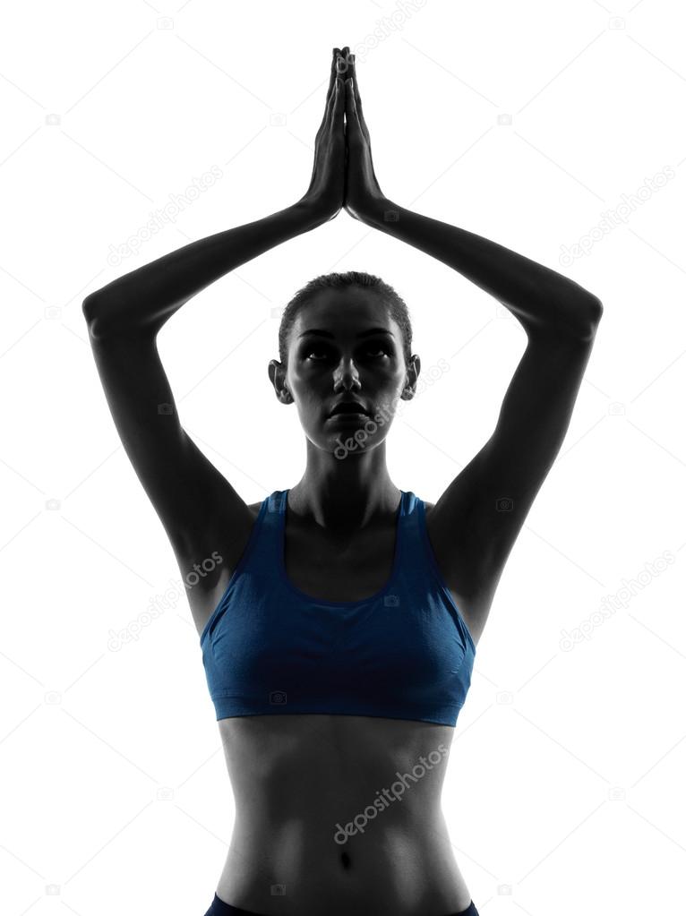 woman exercising yoga hands joined portrait
