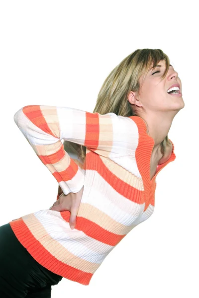 Mulher expressiva caucasiana segurando suas costas — Fotografia de Stock