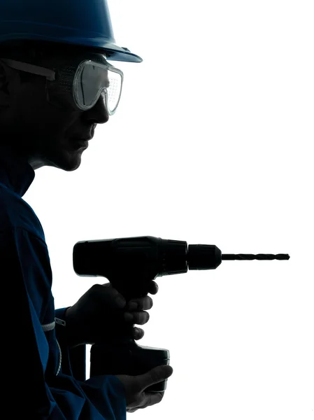 Mann Bauarbeiter hält Bohrmaschine Silhouette — Stockfoto