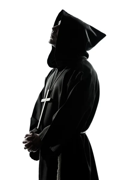 Man monnik priester silhouet bidden — Stockfoto