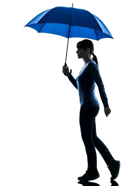 Woman holding umbrella silhouette — Stock Photo, Image