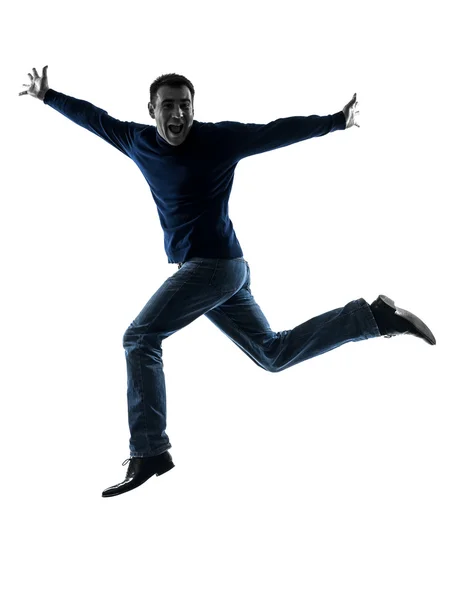 Man happy jumping saluting silhouette full length — Stock Photo, Image