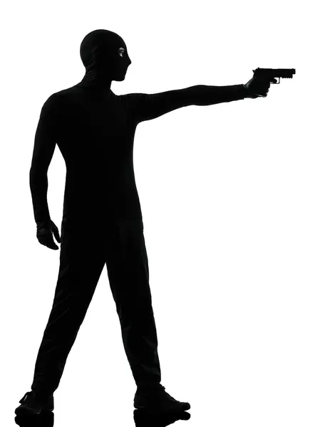 Thief criminal terrorist aiming gun man — Stock Photo, Image