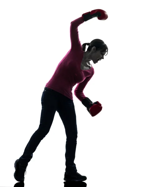 Mature woman with boxing gloves silhouette — Stock Photo, Image