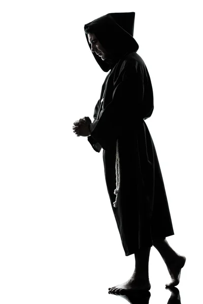 Man monnik priester silhouet bidden — Stockfoto