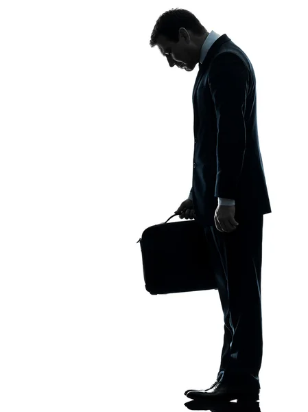 Sad business man looking down silhouette — Stock Photo, Image