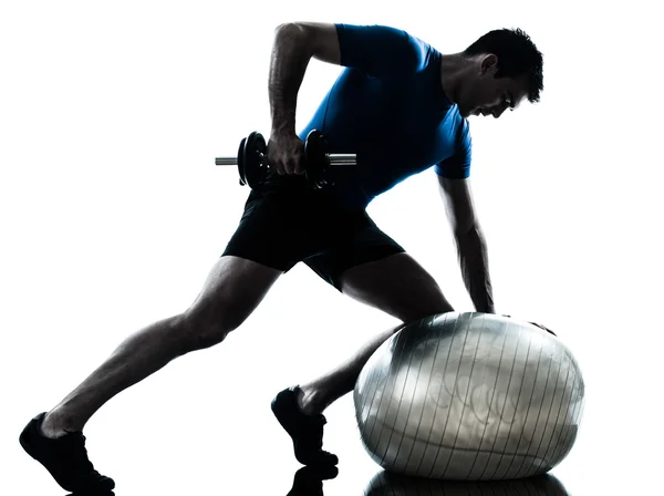 Człowiek wykonując Waga szkoleń treningu fitness postawy — Zdjęcie stockowe