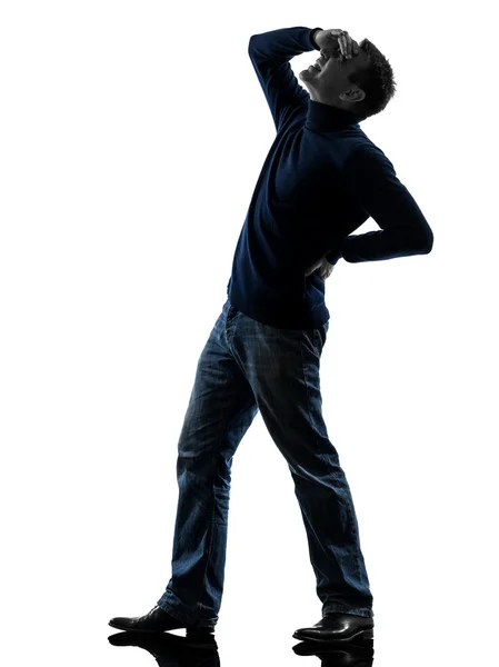 Man backache pain silhouette full length — Stock Photo, Image