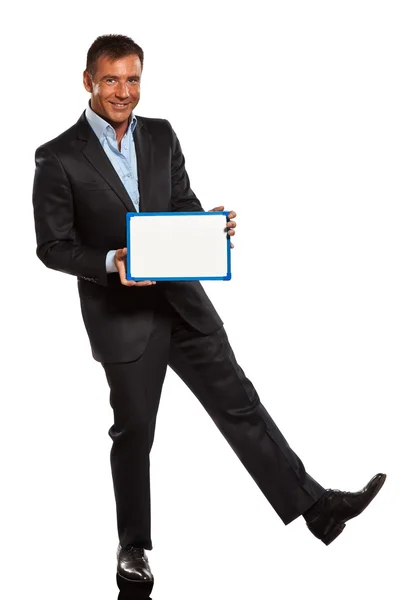 One business man holding showing whiteboard full length Royalty Free Stock Images