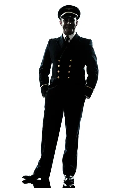 Homem em silhueta uniforme piloto da companhia aérea Imagens De Bancos De Imagens