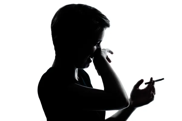 One young teenager boy or girl smoking cigarette — Stock Photo, Image