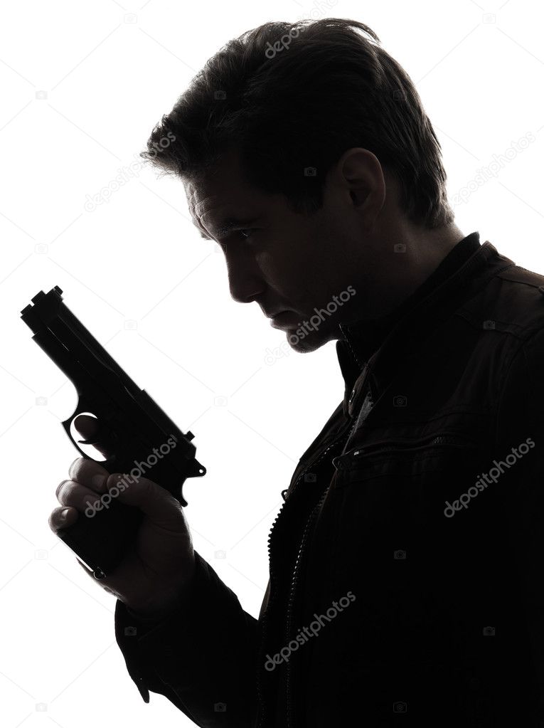 Hombre asesino policía sosteniendo pistola retrato silueta