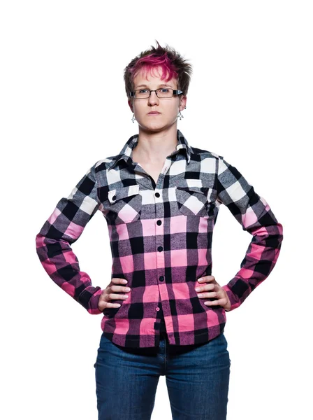 Serious woman standing with arms on waist — Stock Photo, Image
