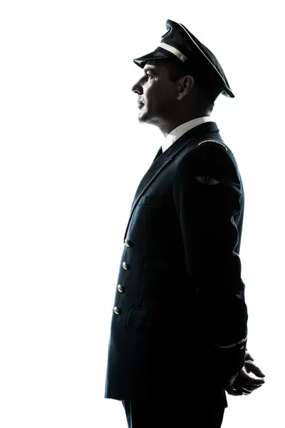 Homem em silhueta uniforme piloto da companhia aérea — Fotografia de Stock