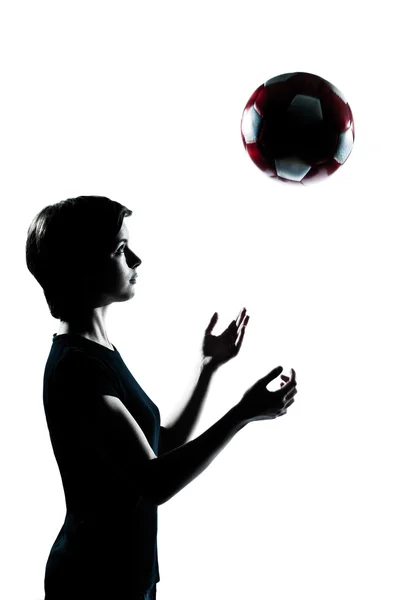 One young teenager girl silhouette tossing soccer football — Stock Photo, Image