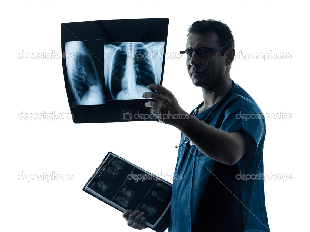 doctor surgeon radiologist examining lung torso x-ray image