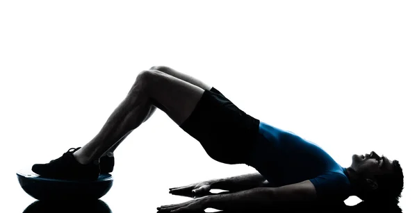 Homem exercício bosu exercício fitness postura silhueta — Fotografia de Stock
