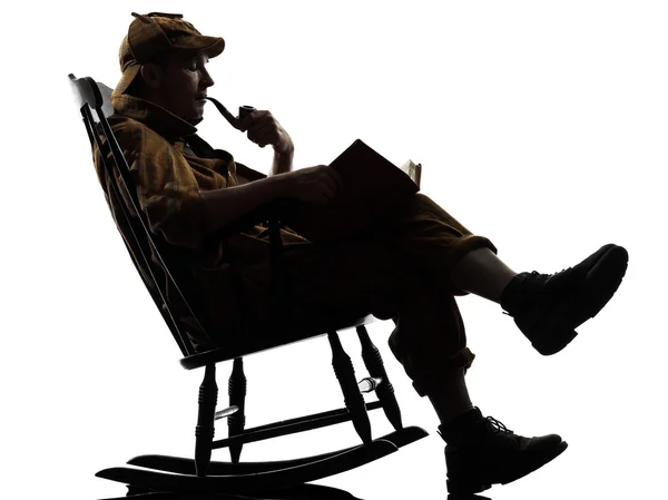 Sherlock holmes reading silhouette — Stock Photo, Image