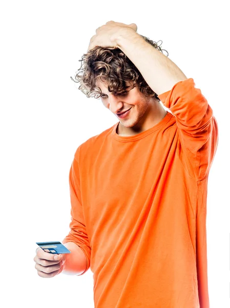 Young man holding credit card portrait — Stock Photo, Image