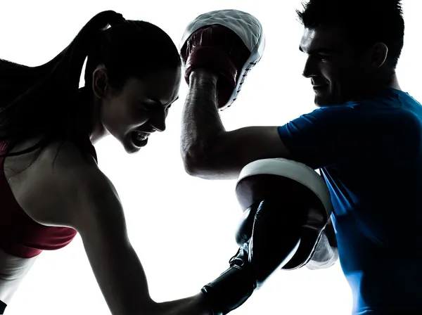 Coach man woman exercising box silhouette — Stock Photo, Image