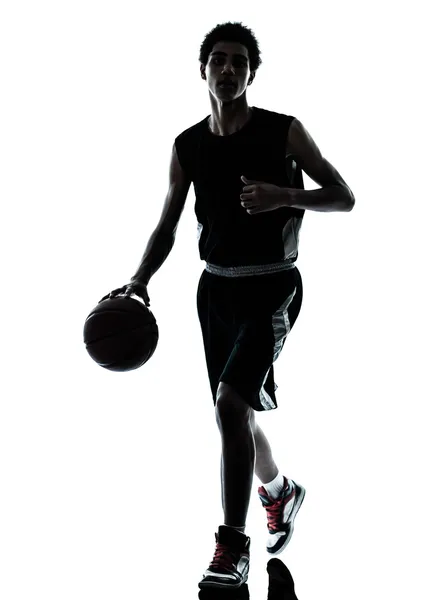 Basketbal speler dribbelen silhouet — Stockfoto