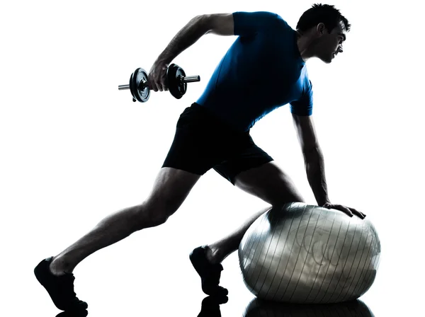 Man exercising weight training workout fitness posture silhouett — Stock Photo, Image