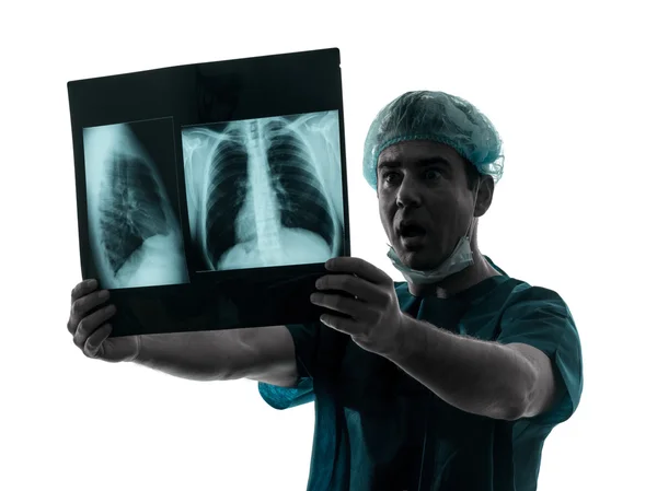 Doktor lékař radiolog překvapen, posouzení plicní trup x-ra ストック画像