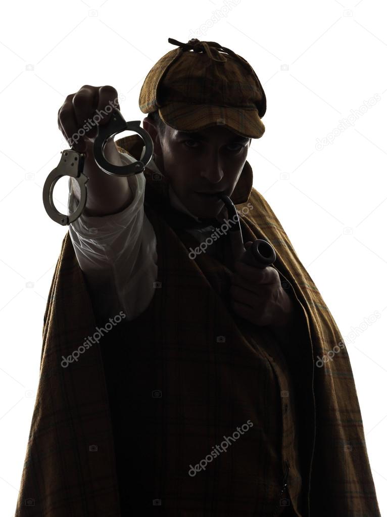 sherlock holmes holding handcuffs silhouette