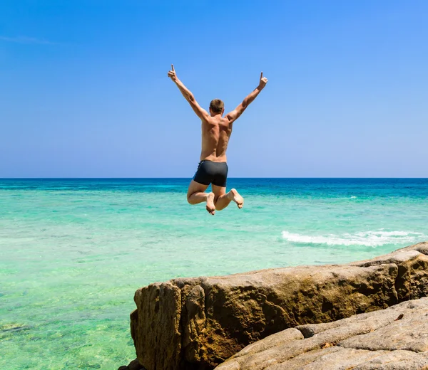 Man jumping in the sea — Stock Photo, Image