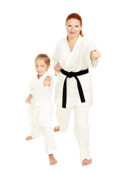 Mom and daughter in kimono punch hand — Stock Photo, Image