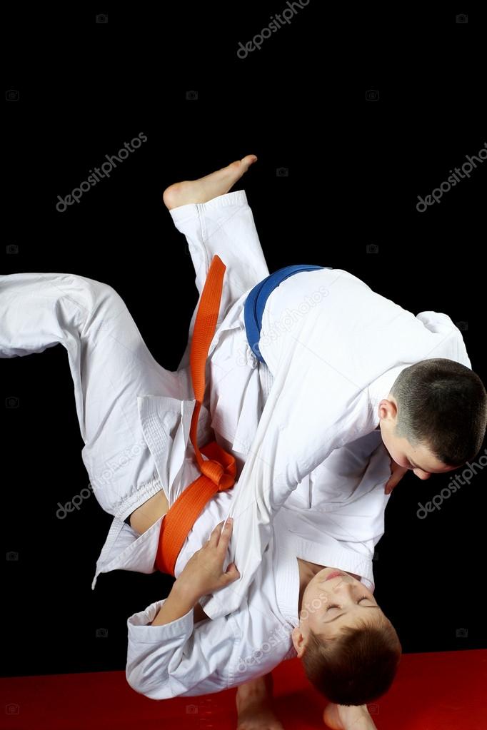 Training nage judo in the performance of an athlete with a blue belt