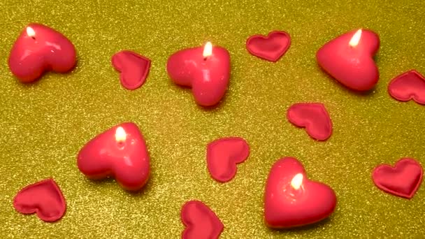 Lot Burning Candles Hearts Golden Glittery Surface — Stock Video