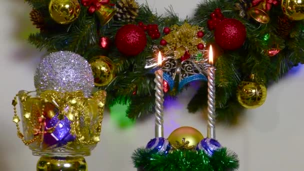 Two Burning Candles Ball Vase Rotating Christmas Tree — Video Stock