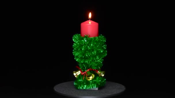 Candle Decorated Green Rain Bells Revolves Black Background — Stockvideo