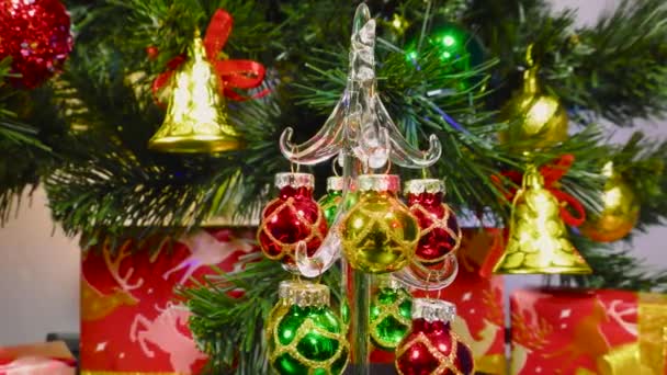 Little Beautiful Christmas Tree Rotates Background Green Christmas Tree Gifts — 图库视频影像