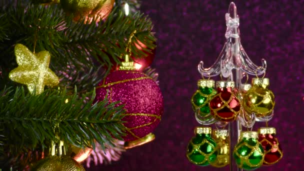 Colored Background Small Christmas Tree Rotates Beautiful Decorated Christmas Tree — 비디오