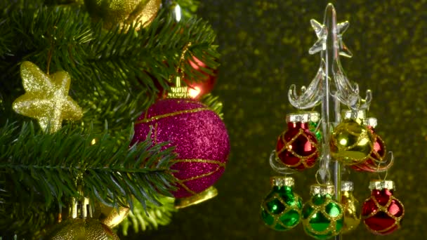 Colored Background Small Christmas Tree Rotates Beautiful Decorated Christmas Tree — Stock video