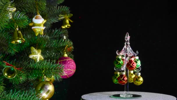 Black Background Small Christmas Tree Rotates Beautiful Decorated Christmas Tree — Stockvideo