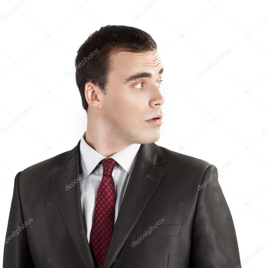 Young businessman looking sideways — Stock Photo © Aksakal 12668830
