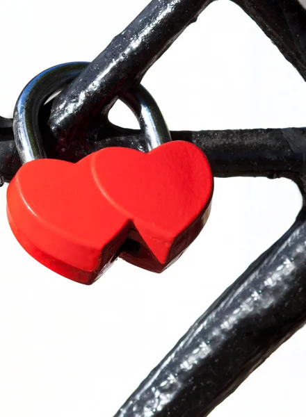 Red lock in the form of two hearts — Stock Photo, Image