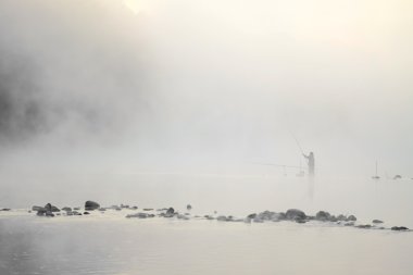 suda duran balıkçı