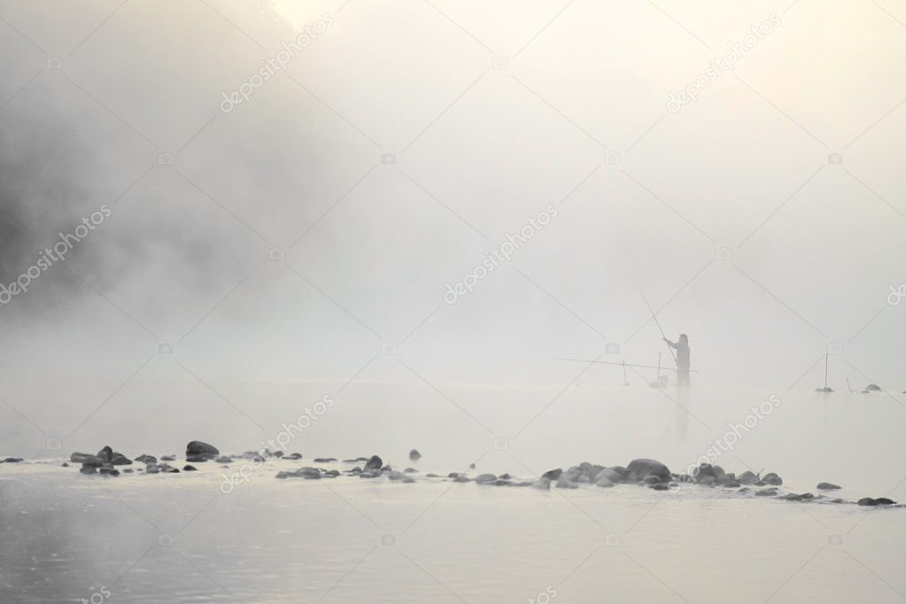 Fisherman standing in the water