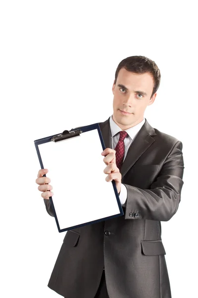 Uomo d'affari che mostra un blocco a appunti vuoto — Foto Stock